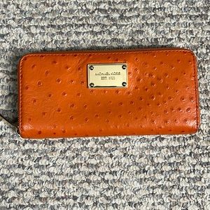 Michael Kors orange ostrich grain leather zip around wallet